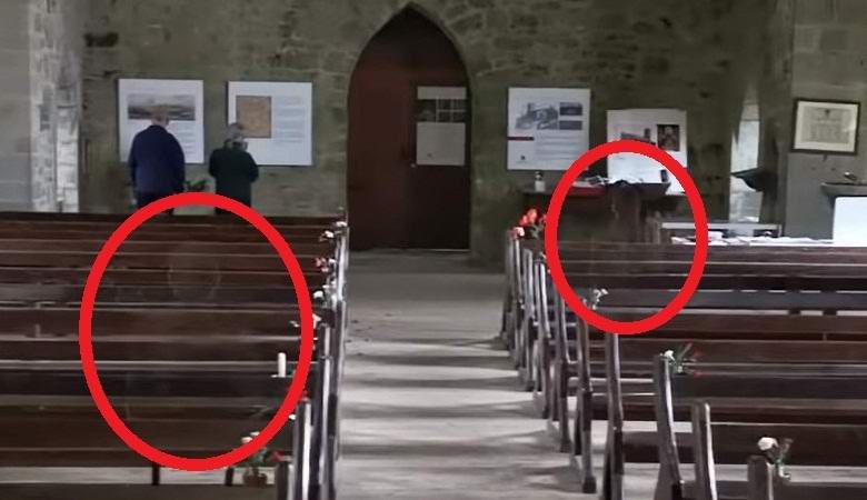 Потусторонние человеческие фигуры в церкви случайно попали на видео